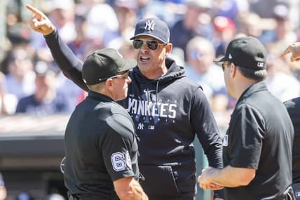 Apr 12, 2023; Cleveland, Ohio, USA; New York Yankees manager Aaron Boone argues a call with umpire Chris Guccione (68) during the first inning against the Cleveland Guardians at Progressive Field. Boone was ejected. Mandatory Credit: Ken Blaze-USA TODAY Sports