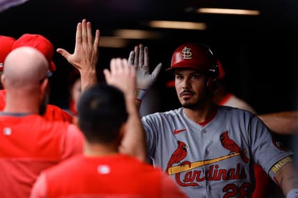 Apr 12, 2023; Denver, Colorado, USA; St. Louis Cardinals designated hitter Nolan Arenado (28) celebrates in the dugout on a two run home run in the fourth inning against the Colorado Rockies at Coors Field. Mandatory Credit: Isaiah J. Downing-USA TODAY Sports