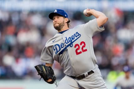 Apr 12, 2023; San Francisco, California, USA;  Los Angeles Dodgers starting pitcher Clayton Kershaw (22) throws against the San Francisco Giants during the first inning at Oracle Park. Mandatory Credit: John Hefti-USA TODAY Sports