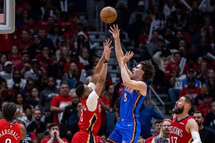 Apr 12, 2023; New Orleans, Louisiana, USA; Oklahoma City Thunder guard Josh Giddey (3) shoots a jump shot over New Orleans Pelicans guard CJ McCollum (3) during the second half at Smoothie King Center. Mandatory Credit: Stephen Lew-USA TODAY Sports