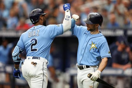 Apr 13, 2023; St. Petersburg, Florida, USA;  Tampa Bay Rays first baseman Yandy Diaz (2) celebrates with Tampa Bay Rays second baseman Brandon Lowe (8) after hitting a home run against the Boston Red Sox in the first inning at Tropicana Field. Mandatory Credit: Nathan Ray Seebeck-USA TODAY Sports
