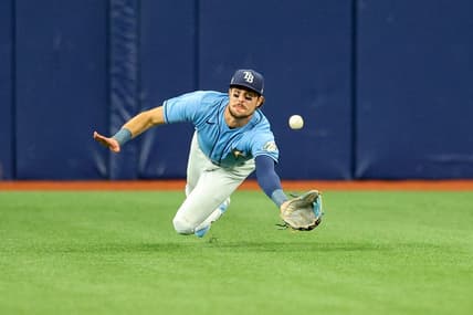 Apr 13, 2023; St. Petersburg, Florida, USA;  Tampa Bay Rays center fielder Josh Lowe (15) dives for a ball against the Boston Red Sox in the fifth inning at Tropicana Field. Mandatory Credit: Nathan Ray Seebeck-USA TODAY Sports