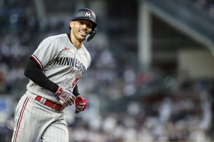 Apr 13, 2023; Bronx, New York, USA;  Minnesota Twins shortstop Carlos Correa (4) reacts after hitting a sole home run in the first inning against the New York Yankees at Yankee Stadium. Mandatory Credit: Wendell Cruz-USA TODAY Sports