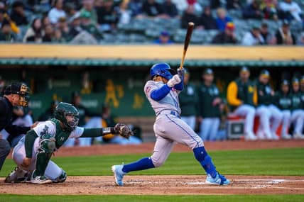Apr 14, 2023; Oakland, California, USA;  New York Mets shortstop Francisco Lindor (12) hits a grand slam home run against the Oakland Athletics during the second inning at RingCentral Coliseum. Mandatory Credit: Neville E. Guard-USA TODAY Sports