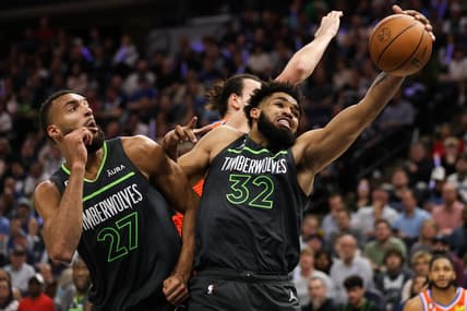 Apr 14, 2023; Minneapolis, Minnesota, USA; Minnesota Timberwolves center Karl-Anthony Towns (32) rebounds the ball against the Oklahoma City Thunder during the second quarter at Target Center. Mandatory Credit: Matt Krohn-USA TODAY Sports