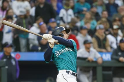 Apr 14, 2023; Seattle, Washington, USA; Seattle Mariners left fielder Jarred Kelenic (10) watches after hitting a two-run home run against the Colorado Rockies during the second inning at T-Mobile Park. Mandatory Credit: Joe Nicholson-USA TODAY Sports