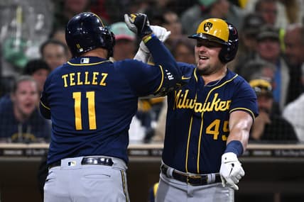 Apr 14, 2023; San Diego, California, USA; Milwaukee Brewers first baseman hitter Rowdy Tellez (11) is congratulated by designated hitter Luke Voit (45) after hitting a home run against the San Diego Padres during the fourth inning at Petco Park. Mandatory Credit: Orlando Ramirez-USA TODAY Sports