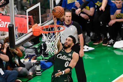 Apr 15, 2023; Boston, Massachusetts, USA; Boston Celtics forward Jayson Tatum (0) shoots a layup against the Atlanta Hawks during the first quarter of game one of the 2023 NBA playoffs at TD Garden. Mandatory Credit: Eric Canha-USA TODAY Sports