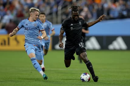 Apr 15, 2023; Queens, New York, USA; Nashville SC forward C.J. Sapong (17) controls the ball against New York City FC  defender Mitja Ilenic (35) during the first half at Citi Field. Mandatory Credit: Brad Penner-USA TODAY Sports
