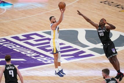Apr 15, 2023; Sacramento, California, USA; Golden State Warriors guard Stephen Curry (30) makes a three point basket over Sacramento Kings forward Harrison Barnes (40) in the fourth quarter during game one of the 2023 NBA playoffs at the Golden 1 Center. Mandatory Credit: Cary Edmondson-USA TODAY Sports