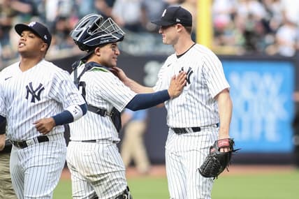 Apr 16, 2023; Bronx, New York, USA;  New York Yankees starting pitcher Gerrit Cole (45) celebrates with catcher Jose Trevino (39) after pitching a complete game shutout to beat the Minnesota Twins 2-0 at Yankee Stadium. Mandatory Credit: Wendell Cruz-USA TODAY Sports
