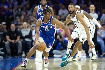 Apr 17, 2023; Philadelphia, Pennsylvania, USA; Philadelphia 76ers guard Tyrese Maxey (0) dribbles the ball  in front of Brooklyn Nets forward Mikal Bridges (1) during the second quarter in game two of the 2023 NBA playoffs at Wells Fargo Center. Mandatory Credit: Bill Streicher-USA TODAY Sports