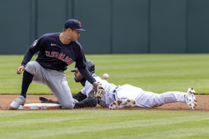 Apr 18, 2023; Detroit, Michigan, USA; Detroit Tigers center fielder Riley Greene (31) steals second base and beats the throw to Cleveland Guardians shortstop Tyler Freeman (2) at Comerica Park. Mandatory Credit: David Reginek-USA TODAY Sports