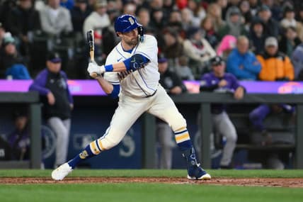 Apr 16, 2023; Seattle, Washington, USA; Seattle Mariners left fielder AJ Pollock (8) waits for the pitch against the Colorado Rockies at T-Mobile Park. Mandatory Credit: Steven Bisig-USA TODAY Sports