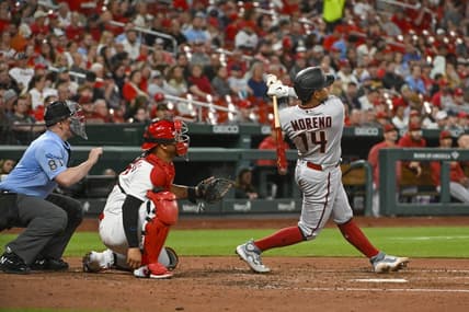 Apr 18, 2023; St. Louis, Missouri, USA;  Arizona Diamondbacks catcher Gabriel Moreno (14) hits a three run home run against the St. Louis Cardinals during the fourth inning at Busch Stadium. Mandatory Credit: Jeff Curry-USA TODAY Sports