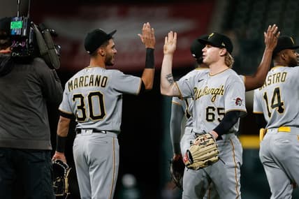 Apr 18, 2023; Denver, Colorado, USA; Pittsburgh Pirates center fielder Jack Suwinski (65) celebrates with second baseman Tucupita Marcano (30) after the game against the Colorado Rockies at Coors Field. Mandatory Credit: Isaiah J. Downing-USA TODAY Sports