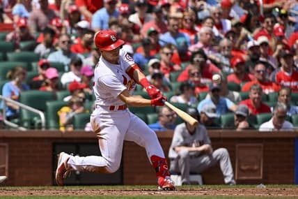 Apr 19, 2023; St. Louis, Missouri, USA;  St. Louis Cardinals shortstop Tommy Edman (19) hits a three run home run against the Arizona Diamondbacks during the third inning at Busch Stadium. Mandatory Credit: Jeff Curry-USA TODAY Sports