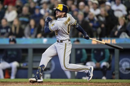 Apr 19, 2023; Seattle, Washington, USA; Milwaukee Brewers second baseman Brice Turang (0) hits a two-run double during the seventh inning against the Seattle Mariners at T-Mobile Park. Mandatory Credit: Stephen Brashear-USA TODAY Sports