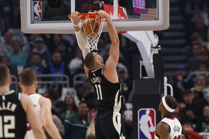 Apr 19, 2023; Milwaukee, Wisconsin, USA; Milwaukee Bucks center Brook Lopez (11) dunks during the first quarter against the Miami Heat during game two of the 2023 NBA Playoffs at Fiserv Forum. Mandatory Credit: Jeff Hanisch-USA TODAY Sports