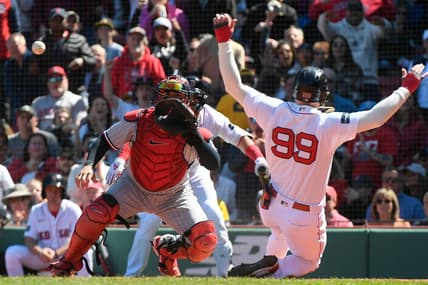 Apr 20, 2023; Boston, Massachusetts, USA; Boston Red Sox right fielder Alex Verdugo (99) slides home against the Minnesota Twins during the third inning at Fenway Park. Mandatory Credit: Eric Canha-USA TODAY Sports