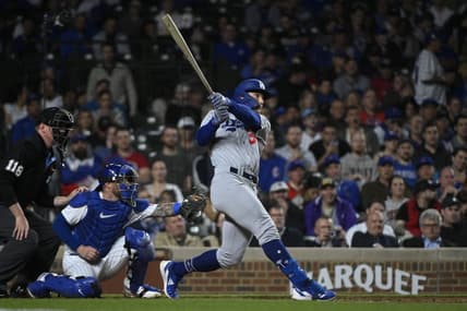 Apr 20, 2023; Chicago, Illinois, USA; Los Angeles Dodgers center fielder James Outman (33) hits a home run against the Chicago Cubs during the third inning at Wrigley Field. Mandatory Credit: Matt Marton-USA TODAY Sports