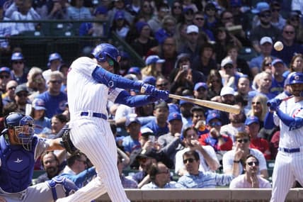 Apr 21, 2023; Chicago, Illinois, USA; Chicago Cubs center fielder Cody Bellinger (24) hits a home run against the Los Angeles Dodgers during the third inning at Wrigley Field. Mandatory Credit: David Banks-USA TODAY Sports