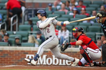 Apr 21, 2023; Atlanta, Georgia, USA; Houston Astros third baseman Alex Bregman (2) hits an RBI double against the Atlanta Braves in the first inning at Truist Park. Mandatory Credit: Brett Davis-USA TODAY Sports