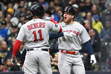 Apr 21, 2023; Milwaukee, Wisconsin, USA; Boston Red Sox right fielder Alex Verdugo (99) celebrates with Boston Red Sox third baseman Rafael Devers (11) after hitting a home run against the Milwaukee Brewers in the third inningat American Family Field. Mandatory Credit: Michael McLoone-USA TODAY Sports