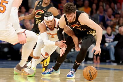 Apr 21, 2023; New York, New York, USA; New York Knicks guard Trevor Keels (3) and Cleveland Cavaliers forward Cedi Osman (16) fight for a loose ball during the second quarter of game three of the 2023 NBA playoffs at Madison Square Garden. Mandatory Credit: Brad Penner-USA TODAY Sports
