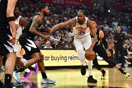 Apr 22, 2023; Los Angeles, California, USA; Phoenix Suns forward Kevin Durant (35) moves to the basket against Los Angeles Clippers forward Marcus Morris Sr. (8) during the first half in game four of the 2023 NBA playoffs at Crypto.com Arena. Mandatory Credit: Gary A. Vasquez-USA TODAY Sports