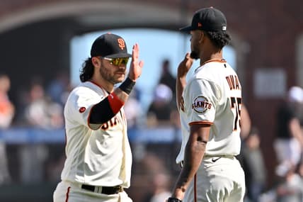 Apr 22, 2023; San Francisco, California, USA; San Francisco Giants pitcher Camilo Doval (75) shakes hands with infielder Brandon Crawford (35) after the final out of the ninth inning against the New York Mets at Oracle Park. Mandatory Credit: Robert Edwards-USA TODAY Sports