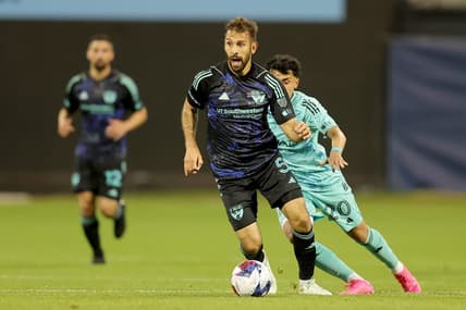 Apr 22, 2023; Flushing, NY, USA; FC Dallas midfielder Facundo Quignon (5) controls the ball against New York City FC midfielder Richard Ledezma (20) during the first half at Citi Field. Mandatory Credit: Brad Penner-USA TODAY Sports