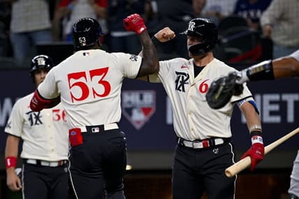 Apr 22, 2023; Arlington, Texas, USA; Texas Rangers right fielder Adolis Garcia (53) and third baseman Josh Jung (6) celebrates after Garcia hits a two run home run against the Oakland Athletics during the third inning at Globe Life Field. Mandatory Credit: Jerome Miron-USA TODAY Sports