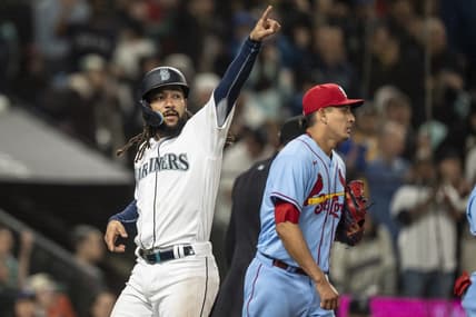 Apr 22, 2023; Seattle, Washington, USA; Seattle Mariners shortstop J.P. Crawford (3) gestures to third baseman Eugenio Suarez (28) after scoring a run during the seventh inning against the St. Louis Cardinals at T-Mobile Park. Mandatory Credit: Stephen Brashear-USA TODAY Sports