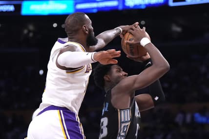 Apr 22, 2023; Los Angeles, California, USA; Los Angeles Lakers forward LeBron James (6) blocks a shot by Memphis Grizzlies forward Jaren Jackson Jr. (13) in the fourth quarter during game three of the 2023 NBA playoffs at Crypto.com Arena. Mandatory Credit: Kirby Lee-USA TODAY Sports