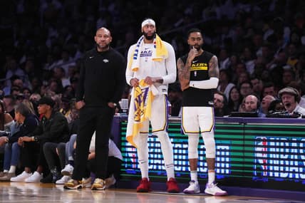 Apr 22, 2023; Los Angeles, California, USA; Los Angeles Lakers coach Darvin Ham (left), forward Anthony Davis (3) and guard D'Angelo Russell (1) react against the Memphis Grizzlies in the fourth quarter during game three of the 2023 NBA playoffs at Crypto.com Arena. Mandatory Credit: Kirby Lee-USA TODAY Sports
