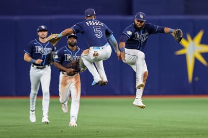 Apr 24, 2023; St. Petersburg, Florida, USA;  Tampa Bay Rays shortstop Wander Franco (5) and Tampa Bay Rays center fielder Manuel Margot (13) celebrate after beating the Houston Astros at Tropicana Field. Mandatory Credit: Nathan Ray Seebeck-USA TODAY Sports