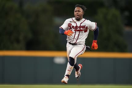 Apr 24, 2023; Cumberland, Georgia, USA; Atlanta Braves second baseman Ozzie Albies (1) runs the bases after hitting a three run triple against the Miami Marlins during the eighth inning at Truist Park. Mandatory Credit: Dale Zanine-USA TODAY Sports