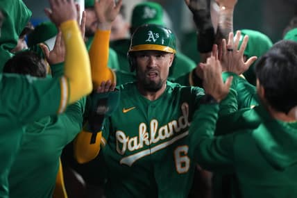 Apr 24, 2023; Anaheim, California, USA; Oakland Athletics third baseman Jace Peterson (6) celebrates after scoring in the 10th inning against the Los Angeles Angels at Angel Stadium. Mandatory Credit: Kirby Lee-USA TODAY Sports