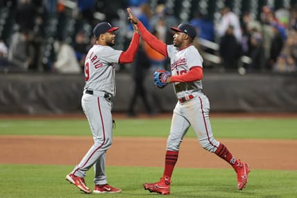 Apr 25, 2023; New York City, New York, USA;  Washington Nationals third baseman Jeimer Candelario (9) and center fielder Victor Robles (16) high five after the game against the New York Mets at Citi Field. Mandatory Credit: Vincent Carchietta-USA TODAY Sports