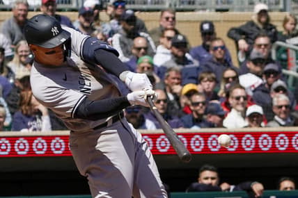 Apr 26, 2023; Minneapolis, Minnesota, USA; New York Yankees designated hitter Aaron Judge (99) hits a single against the Minnesota Twins during the fifth inning at Target Field. Mandatory Credit: Nick Wosika-USA TODAY Sports