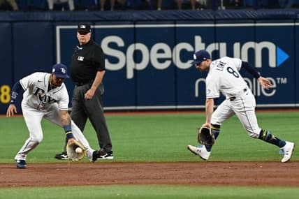 Apr 26, 2023; St. Petersburg, Florida, USA; Tampa Bay Rays shortstop Wander Franco (left) fields a ground ball in front of second baseman Brandon Lowe (8) in the third inning against the Houston Astros at Tropicana Field. Mandatory Credit: Jonathan Dyer-USA TODAY Sports