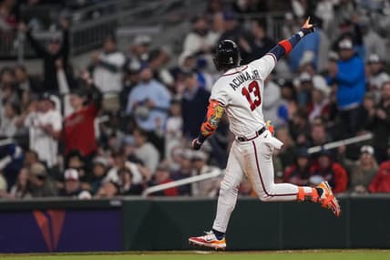 Apr 26, 2023; Cumberland, Georgia, USA;  Atlanta Braves right fielder Ronald Acuna Jr. (13) reacts after hitting a home run against the Miami Marlins during the sixth inning at Truist Park. Mandatory Credit: Dale Zanine-USA TODAY Sports