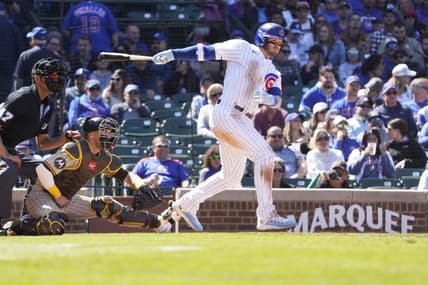 Apr 27, 2023; Chicago, Illinois, USA; Chicago Cubs left fielder Ian Happ (8) hits a RBI single against the San Diego Padres during the fifth inning at Wrigley Field. Mandatory Credit: David Banks-USA TODAY Sports