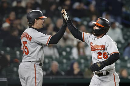 Apr 27, 2023; Detroit, Michigan, USA; Baltimore Orioles left fielder Ryan McKenna (26) receives congratulations from catcher Adley Rutschman (35) after scoring in the seventh inning against the Detroit Tigers at Comerica Park. Mandatory Credit: Rick Osentoski-USA TODAY Sports