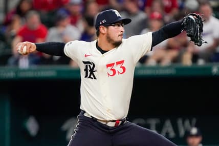 Apr 28, 2023; Arlington, Texas, USA; Texas Rangers relief pitcher Dane Dunning (33) throws to the plate during the fifth inning against the New York Yankees at Globe Life Field. Mandatory Credit: Raymond Carlin III-USA TODAY Sports