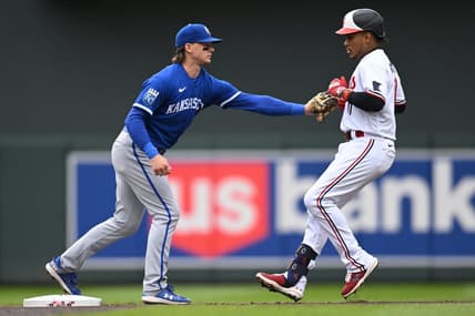 Apr 29, 2023; Minneapolis, Minnesota, USA; Kansas City Royals shortstop Bobby Witt Jr. (7) tags out Minnesota Twins second baseman Jorge Polanco (11) at second base during the first inning at Target Field. Mandatory Credit: Jeffrey Becker-USA TODAY Sports