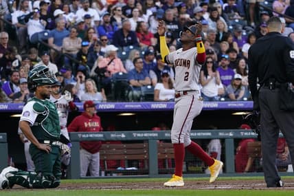 Apr 29, 2023; Denver, Colorado, USA;  Arizona Diamondbacks shortstop Geraldo Perdomo (2) crosses the plat after his three-run homer in the second inning at Coors Field. Mandatory Credit: Michael Madrid-USA TODAY Sports