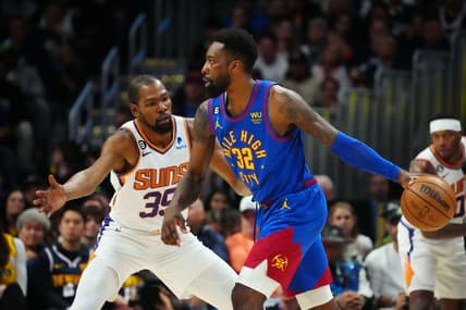 Apr 29, 2023; Denver, Colorado, USA; Denver Nuggets forward Jeff Green (32) controls the ball while defended by Phoenix Suns forward Kevin Durant (35) in the first half during game one of the 2023 NBA Playoffs at Ball Arena. Mandatory Credit: Ron Chenoy-USA TODAY Sports