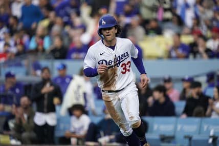 Apr 29, 2023; Los Angeles, California, USA;  Los Angeles Dodgers center fielder James Outman (33) scores a run against the St. Louis Cardinals during the second inning at Dodger Stadium. Mandatory Credit: Lucas Peltier-USA TODAY Sports